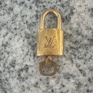 Louis Vuitton Shiny Gold Padlock with Key